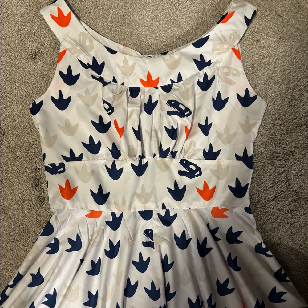 Charming White Dress with Colorful Dinosaur Print - Picture 2 of 5